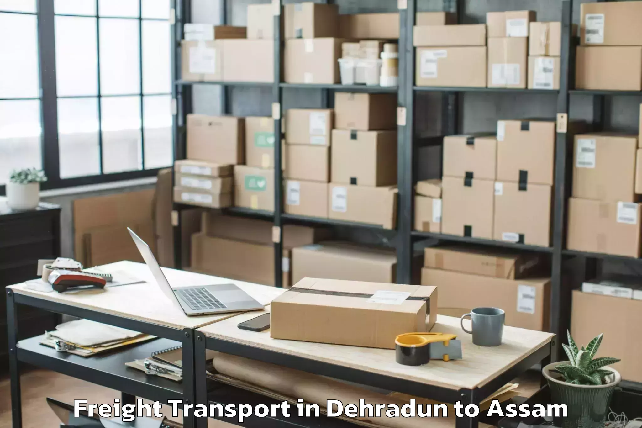 Quality Dehradun to Moran Freight Transport